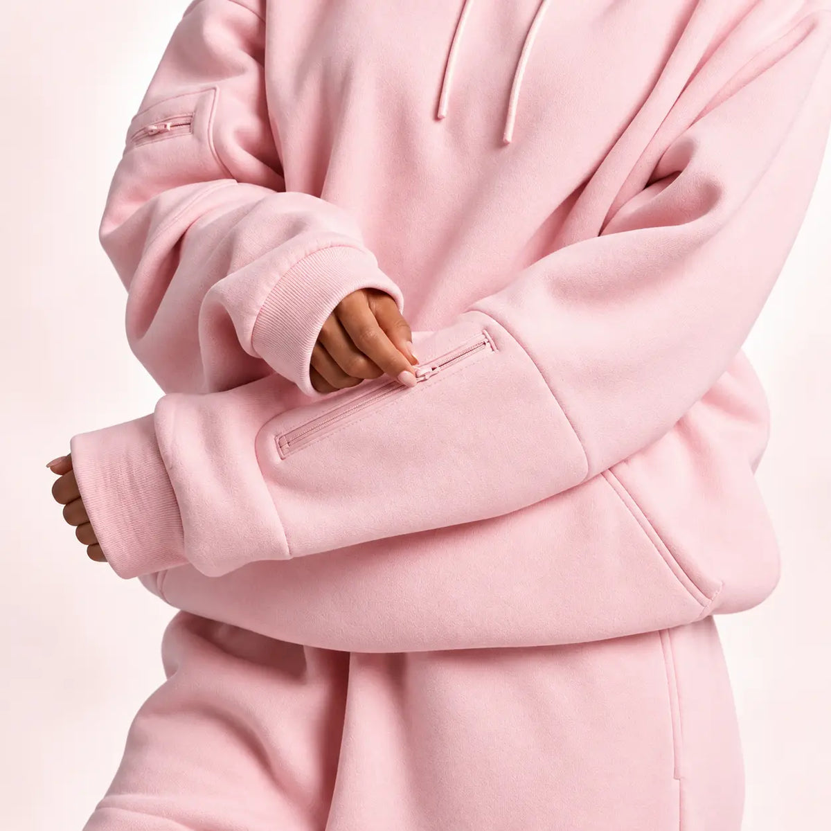Zippered sleeve pocket